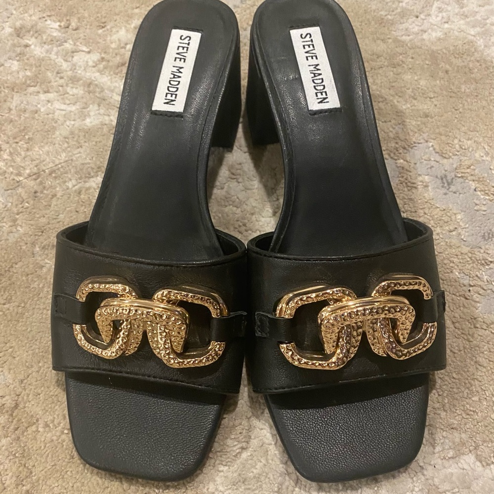 Steve Madden Black and Gold Mules with Metallic Hardware
